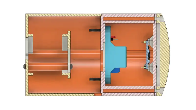 Section view of the unit, showing the pump chamber and the electronics compartment.