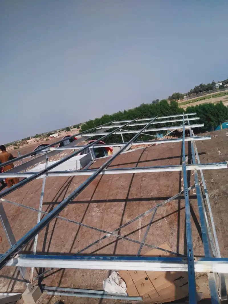 Looking along the frames from one end of the roof.