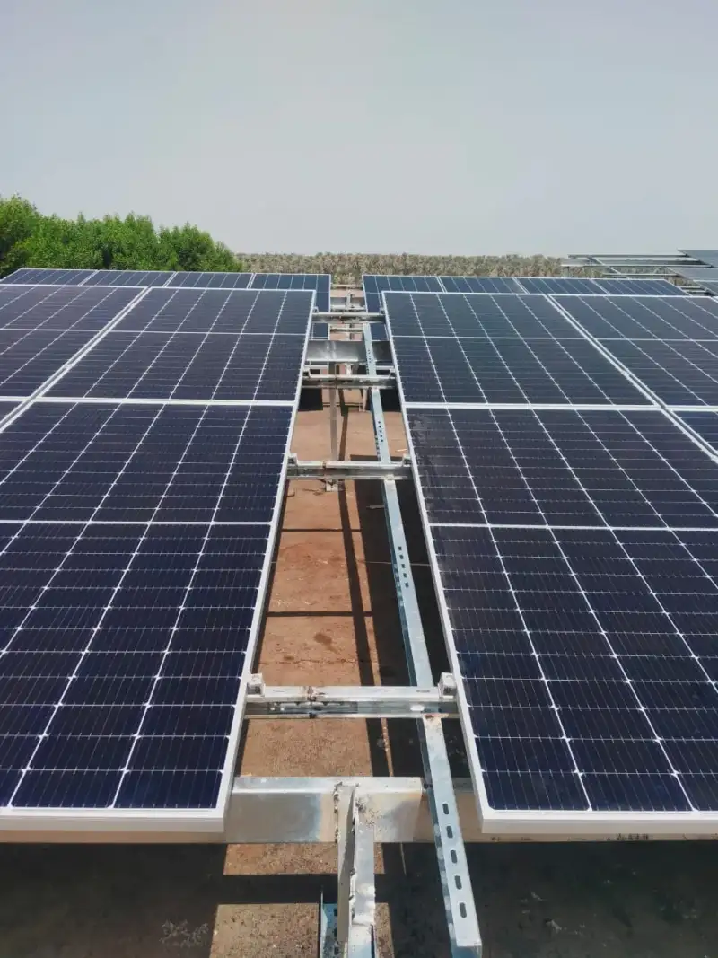 Solar panels mounted in rows on the finished structure.
